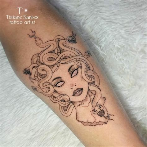 women's small medusa tattoo.